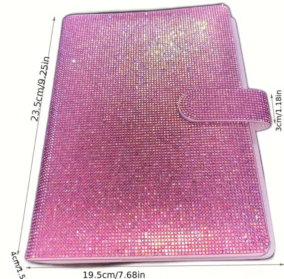 Diamond sparkle paper clip in book.