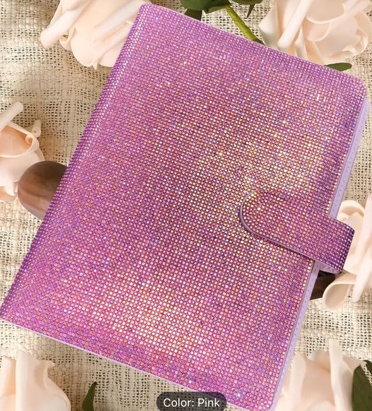 Diamond sparkle paper clip in book.