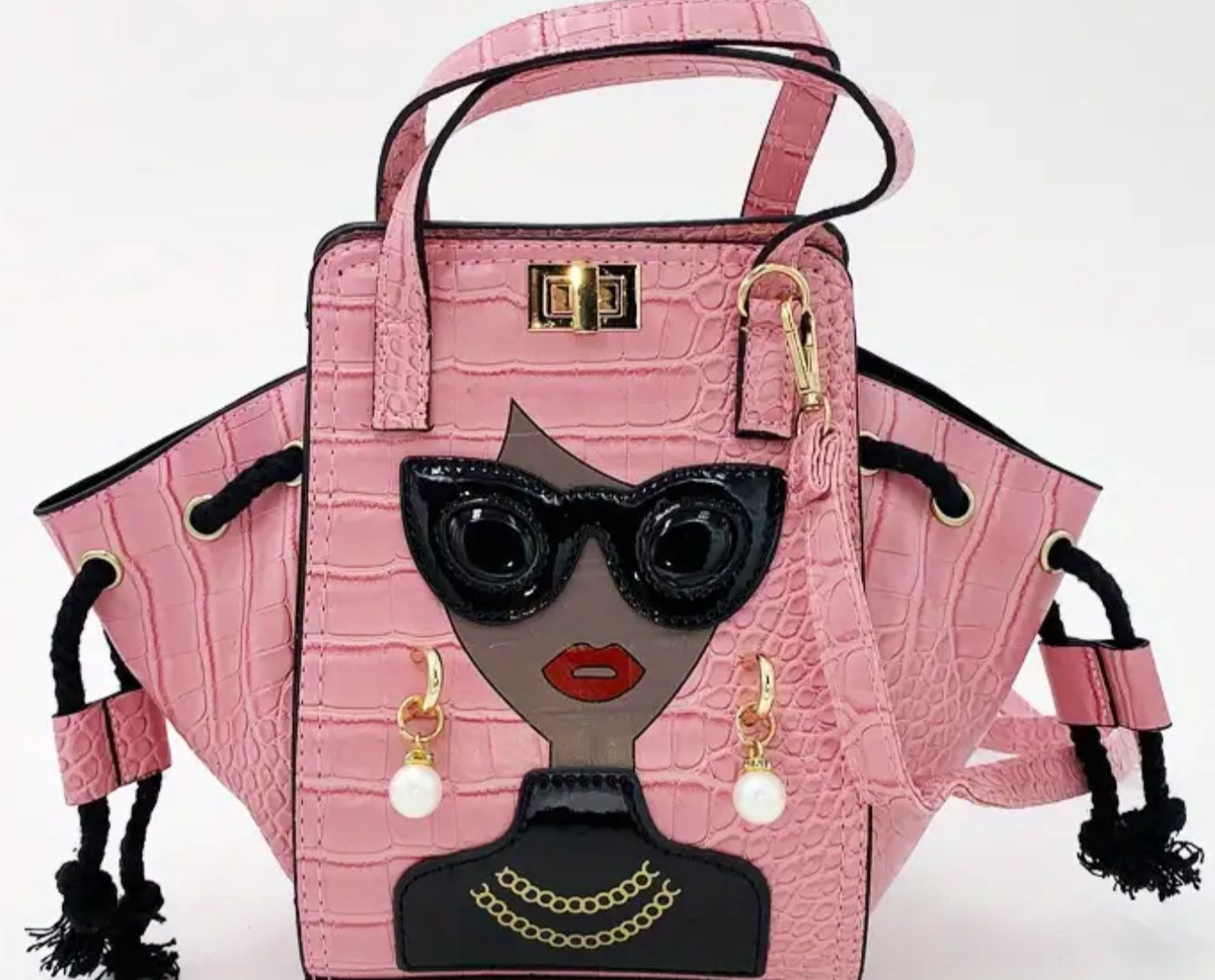 Chic women’s tote, with early and diamond sparkle earrings.